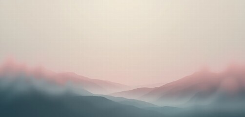 Fototapeta premium Misty morning wallpaper image of mountains with fog and clouds over hills and valleys at sunrise