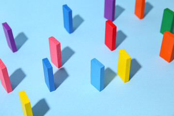 Colorful building blocks on color background