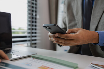 Fototapeta premium two busy professional executive team business people working together on business finances analysis at office meeting, professional manager consulting corporate client