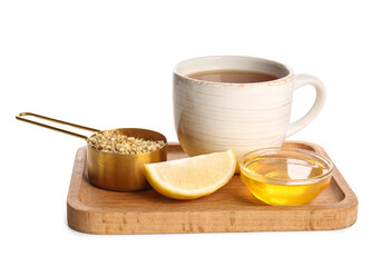 Cup of hot buckwheat tea with lemon and glass bowl of honey on white background