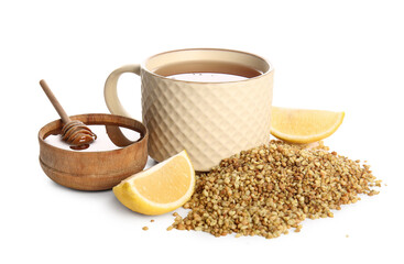 Cup of hot buckwheat tea with lemon and wooden bowl of honey on white background