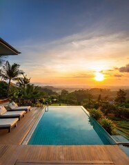 Swimming pool in luxury hotel resort at sunset time. Swimming pool with view on tropical landscape