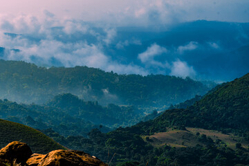 Mystic Light: Sun, Clouds, and Mist over Munnar