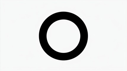 A simple black circle on a white background, emphasizing minimalism and design.