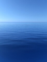 Fototapeta premium Calm ocean, clear blue sky.