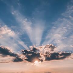 Dramatic Sunset Sky with Sun Rays Bursting Through Cloudscape