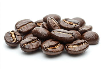 Obraz premium Coffee beans scattered on white background, showcasing their rich texture and inviting aroma.