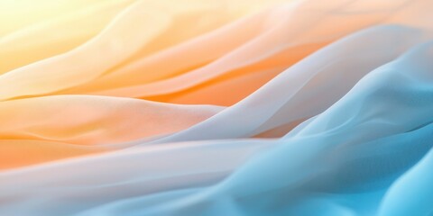 Obraz premium Soft material sensory concept. Soft, flowing fabric in pastel hues of orange and blue, creating a serene and calming atmosphere.