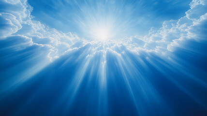 Celestial Light: A breathtaking view of the sun shining through clouds, casting ethereal rays of light down to the earth. The blue sky and fluffy clouds create a serene and inspiring atmosphere.
