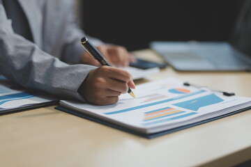 Business Documents, Auditor businesswoman checking searching document legal prepare paperwork or report for analysis TAX time,accountant Documents data contract partner deal in workplace office