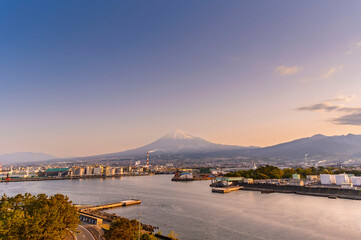 Japan industrial factory area with Fuji mountain and blue sky background view from Fishing port,...