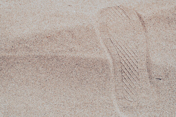 Footprint of shoe in sand