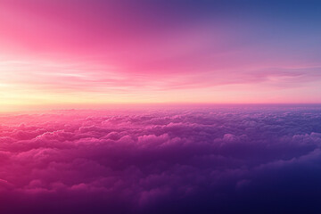 Aerial sunset view above pink clouds with vibrant sky