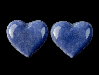 Fototapeta premium Heart-shaped clouds drift across a vivid blue sky, creating a serene and dreamy Valentine's concept.