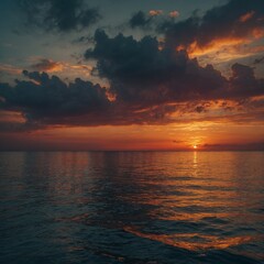 Fototapeta premium A calm sea during a fiery sunset.