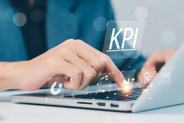 KPI, business performance indicators, Businessman working with data management system on virtual screen to make report with KPI, metrics connected to database. finance, operations, sales, marketing.