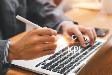KPI, business performance indicators, Businessman working with data management system on virtual screen to make report with KPI, metrics connected to database. finance, operations, sales, marketing.
