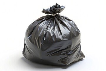 A black plastic bag with a plastic handle is sitting on a white background