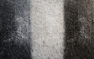 Obraz premium A hyper-realistic background of ultra-fine sand in a soft gradient of three colors: light grey, pale charcoal, and soft slate black. 