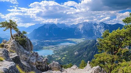 Breathtaking panoramic mountain landscape with lakes and dramatic clouds in the sky on a sunny day