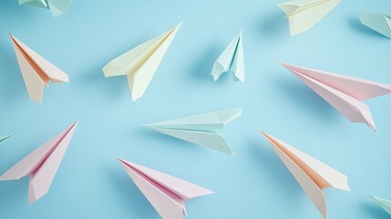 Pastel colored paper planes in dynamic flight paths against a blue background symbolizing creativity innovation and strategic thinking