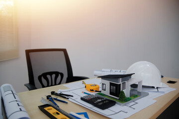 Architects, engineers, contractors working in the office with blueprints, inspection engineers Work analysis for architectural plan, construction project sketch, focus, business construction concept.