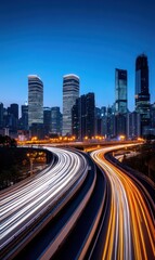 Fototapeta premium Vibrant Night Scene of Urban Highway with Light Trails and Skyscrapers in a Modern Cityscape