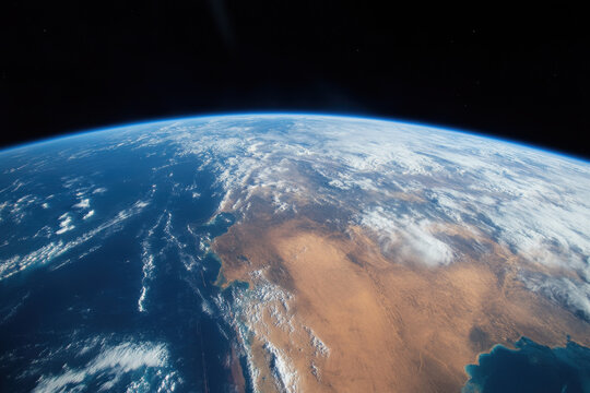 Close up view of Earth from outer space showing weather systems and mountain ranges - Powered by Adobe