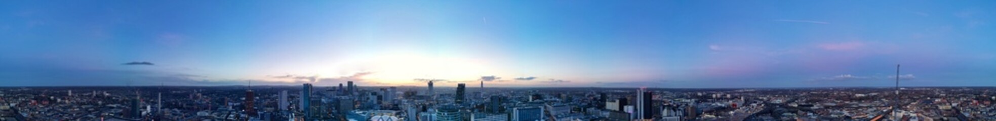 Fototapeta premium High Angle Ultra Wide Panoramic View of Buildings at Downtown Central Birmingham City of England United Kingdom During Sunset. Aerial View of Was Captured with Drone's Camera on March 30th, 2024