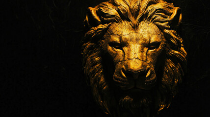 A majestic golden lion head carved from stone glows faintly against a black background, highlighting its intricate details and regal presence.