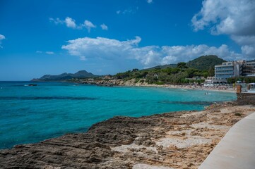 Turquoise waters and rocky shore in Mallorca
