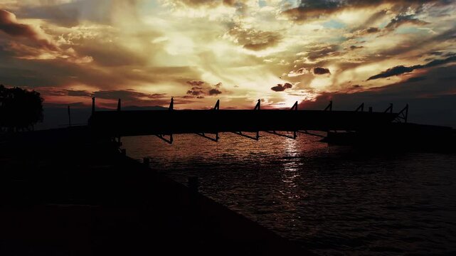 Bridge Silhouette in Cludy Sunset Light