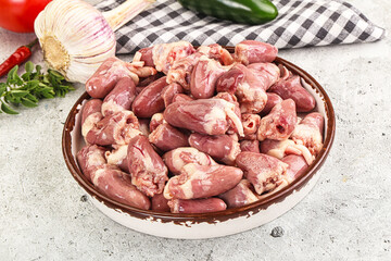 Fresh raw chicken hearts in the bowl