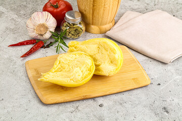 Italian traditional yellow Scamorza cheese
