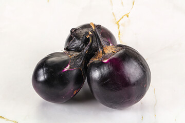 Raw violet and black eggplant