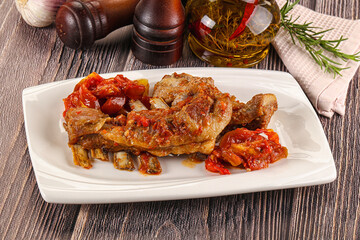 Baked lamb ribs with vegetables