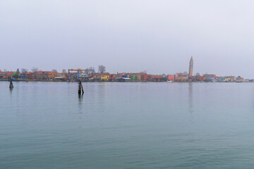 Coastline View of Burano Island from Mazzorbo with Colorful Houses and the Leaning Tower of San Martino