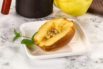 Baked quince with honey and cedar