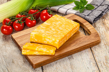 Marble yellow cheese with slices