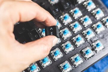 Closeup computer PC keyboard mechanical key under keycaps button for cleaning or change type of key
