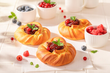 Tasty and homemade berries yeast cake with crumble and fruits.