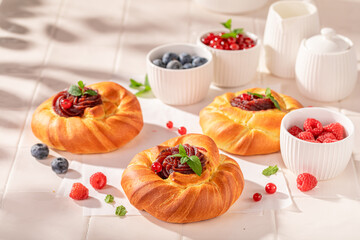 Tasty and homemade berries yeast cake made of yeast dough.