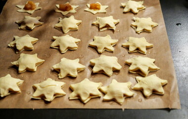 Puff pastry stars with apple filling on reused parchment. A light festive treat, perfect for...