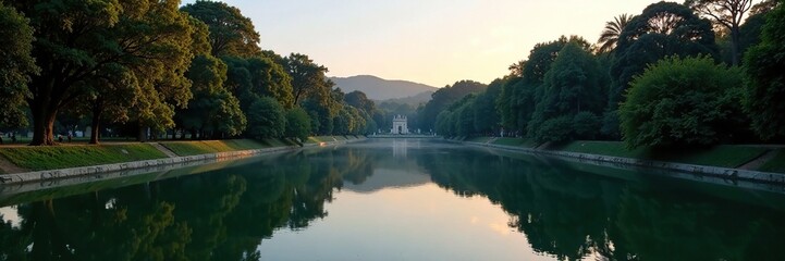 Fototapeta premium A serene lake in the Vatican Gardens reflected in the stillness of the evening, serenity, trees