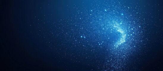 Obraz premium Abstract blue background with shimmering particles and light effects.