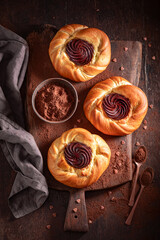 Tasty chocolate pudding yeast cake with vanilla and cream.