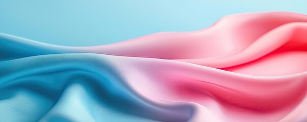Fototapeta premium Soft abstract background idea. Soft, flowing fabric in blue and pink hues creates an elegant and calming backdrop.