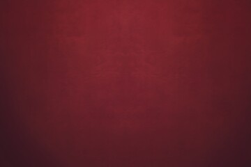 A solid dark red background with subtle gradient variations. The texture is plain and simple, ideal as a backdrop or for abstract designs. The color is a deep maroon or burgundy.