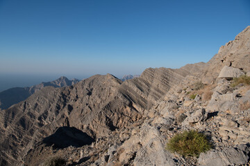 Jebel Jais, the UAE's tallest peak, offers breathtaking views, thrilling ziplines, and cool weather. A serene retreat for adventurers and nature lovers with stunning sunsets.