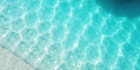 Obraz premium Aqua Serenity Underwater Scene of Crystal Clear Water with Light Reflections and Sandy Bottom